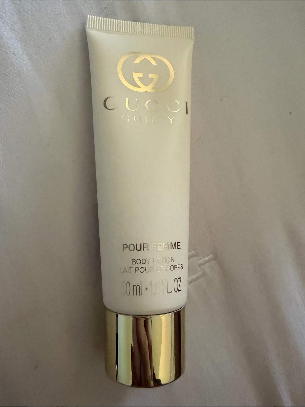 Gucci Guilty Pour Femme Body Lotion — White with Gold Accents